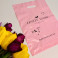 Die Cut Handle plastic bag for privat-label 30x40(+3) cm, 50 μm, pink, LDPE